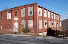 201 Roseto Ave., a two-story brick industrial building off Route 191 in Roseto, is one of two Slate Belt properties that have already sold.