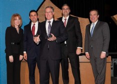 Steve Follett (center), president and CEO of the Follett Corporation, one of the award winners, along with presenter Don Cunningham (right), president and CEO of LVEDC. (Photo by Keith Muccilli)