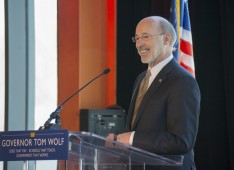 Gov. Tom Wolf speaking at the ArtsQuest Center in Bethlehem.