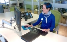 Courtney Steckert, a retail center sales and service representative, working at the Capital Blue health and wellness store.