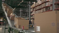 The new e-commerce center will have the capacity to process hundreds of thousands of packages each day.