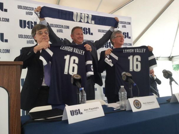 United Soccer League CEO and Managing Partner Alex Papadakis (left) and Philadelphia Union CEO and Operating Partner Nick Sakiewicz (center) join Lehigh University President John Smion (right) in announcing the Lehigh Valley's new soccer team.