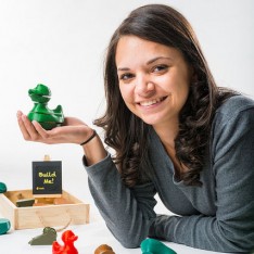 Lauren Villaverde holding one of the puzzles from her company, Stackablz.