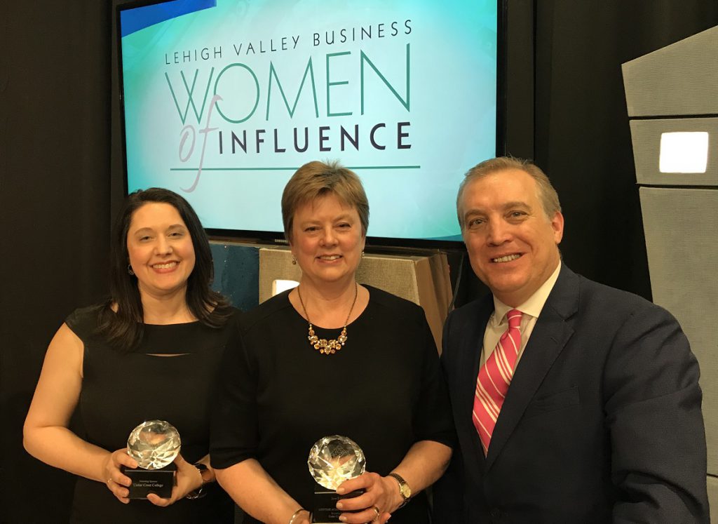 LVB Women of Influence honorees Jaime Whalen (left) and Jane Long (center) stand with LVEDC President & CEO Don Cunningham.